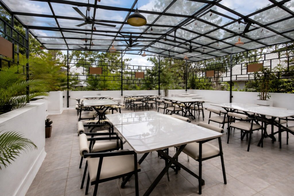Best Rooftop Restaurant in Sambhajinagar featuring spacious covered rooftop dining and modern seating
