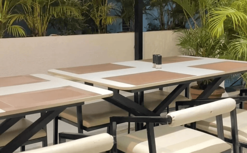 Best Rooftop Restaurant in Sambhajinagar with outdoor tables, comfortable seating and green ambience